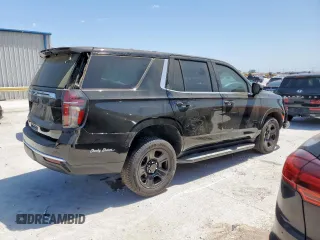 2023 Chevrolet Tahoe Commercial with VIN 1GNSCLEDXPR447042, listed as a Copart auction lot 52399275 with 22,205 mi miles and Salvage title. Bid and sale history available at DreamBid. Image 3.