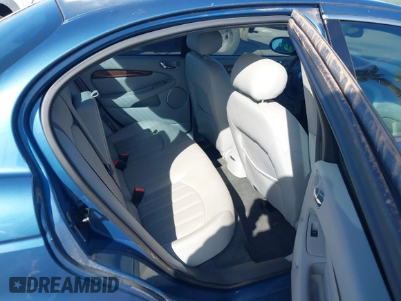 2002 Jaguar X-Type with VIN SAJEA51C42WC11103, listed as a IAAI auction lot 41699366 with 106,418 mi miles and . Bid and sale history available at DreamBid. Image 8.