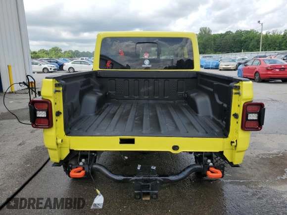 2024 Jeep Gladiator Mojave X with VIN 1C6JJTEG8RL104585, listed as a Copart auction lot 54528735 with 7,528 mi miles and Salvage title. Bid and sale history available at DreamBid. Image 6.