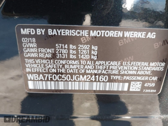 2018 BMW 7 Series 750i with VIN WBA7F0C50JGM24160, listed as a IAAI auction lot 41448519 with 138,742 mi miles. Bid and sale history available at carsss.com. Image 9.