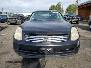 2004 Infiniti G35 w/Leather z VIN JNKCV51F34M708688, wystawiony jako Copart lot #59127945 z przebiegiem 199 727 mil mil oraz Szkoda całkowita • Salvage title. Historia ofert i sprzedaży dostępna na DreamBid. Obrazek 5.