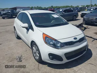 2013 Kia Rio SX with VIN KNADN5A30D6097807, listed as a IAAI auction lot 41958802 with 23,944 mi miles. Bid and sale history available at carsss.com. Image 1.