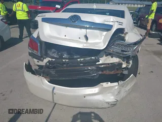 2010 Buick LaCrosse CXL with VIN 1G4GC5EGXAF228056, listed as a IAAI auction lot 42603639 with 125,448 mi miles and . Bid and sale history available at DreamBid. Image 6.