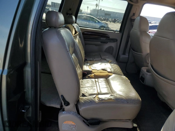 2001 Ford Excursion Limited with VIN 1FMNU42S71EA39829, listed as a Copart auction lot 79094054 with 405,339 mi miles and Salvage title. Bid and sale history available at DreamBid. Image 11.