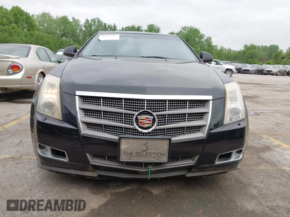 2009 Cadillac CTS AWD w/1SB with VIN 1G6DT57V290165006, listed as a IAAI auction lot 42144947 with 162,969 mi miles. Bid and sale history available at carsss.com. Image 6.