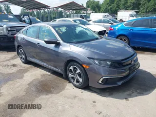 2020 Honda Civic LX with VIN 2HGFC2F61LH596441, listed as a IAAI auction lot 42709053 with 48,557 mi miles and . Bid and sale history available at DreamBid. Image 1.