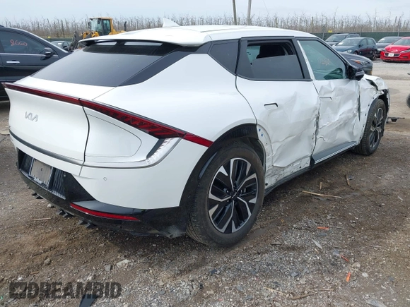 2022 Kia EV6 Wind z VIN KNDC3DLC5N5039405, wystawiony jako IAAI lot #41937250 z przebiegiem 55 659 mil mil oraz . Historia ofert i sprzedaży dostępna na DreamBid. Obrazek 4.