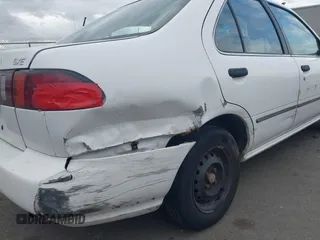 1996 Nissan Sentra XE z VIN 3N1AB41D2TL013267, wystawiony jako IAAI lot #41505728 z przebiegiem 232 387 mil mil oraz . Historia ofert i sprzedaży dostępna na DreamBid. Obrazek 6.