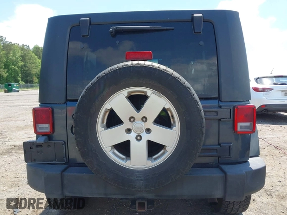 2007 Jeep Wrangler Unlimited Sahara with VIN 1J4GA59117L216687, listed as a IAAI auction lot 42188257 with 176,507 mi miles and . Bid and sale history available at DreamBid. Image 17.