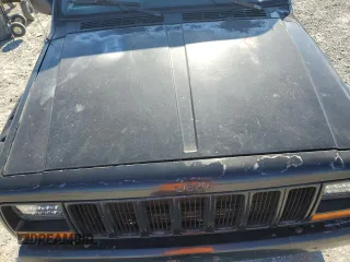 1997 Jeep Cherokee Country with VIN 1J4FJ78S2VL574492, listed as a Copart auction lot 88568685 with 244,465 mi miles and Salvage Title. Bid and sale history available at carsss.com. Image 11.