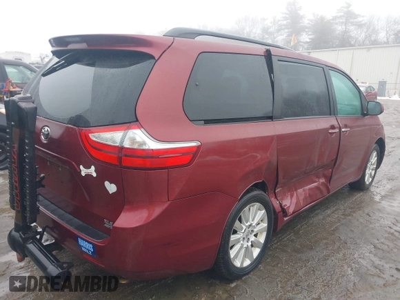 2015 Toyota Sienna Ltd with VIN 5TDDK3DC5FS106080, listed as a IAAI auction lot 41579010 with 133,495 mi miles. Bid and sale history available at carsss.com. Image 4.