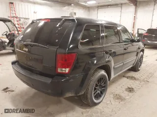 2008 Jeep Grand Cherokee Laredo with VIN 1J8GR48K08C138979, listed as a IAAI auction lot 41081490 with 191,733 mi miles. Bid and sale history available at carsss.com. Image 4.