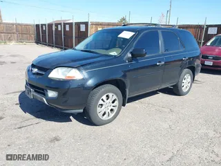 2003 Acura MDX Touring Pkg RES w/Navigation System with VIN 2HNYD18913H514157, listed as a IAAI auction lot 42034863 with 235,941 mi miles. Bid and sale history available at carsss.com. Image 2.