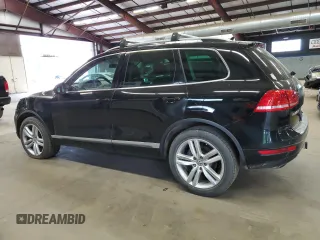 2012 Volkswagen Touareg Sport z VIN WVGEF9BP9CD011879, wystawiony jako Copart lot #56903035 z przebiegiem 198 262 mil mil oraz Czysty tytuł • Clean title. Historia ofert i sprzedaży dostępna na DreamBid. Obrazek 2.