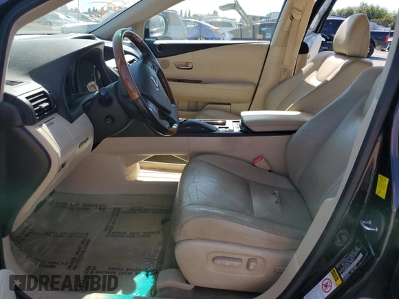 2010 Lexus RX 450h with VIN JTJZB1BA1A2400309, listed as a Copart auction lot 62584925 with 131,357 mi miles and Salvage title. Bid and sale history available at DreamBid. Image 7.