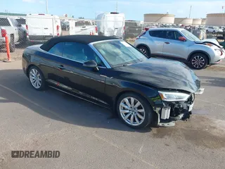 2018 Audi A5 Cabriolet Premium Plus z VIN WAUYNGF54JN008779, wystawiony jako IAAI lot #40763875 z przebiegiem 53 346 mil mil oraz . Historia ofert i sprzedaży dostępna na DreamBid. Obrazek 1.