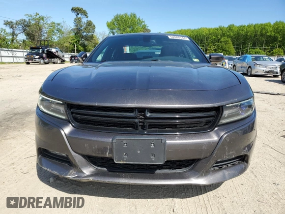 2015 Dodge Charger SXT with VIN 2C3CDXHG8FH794623, listed as a Copart auction lot 52000144 with 145,624 mi miles and Salvage Title. Bid and sale history available at DreamBid. Image 5.