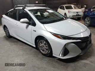 2022 Toyota Prius LE z VIN JTDKAMFP8N3214449, wystawiony jako IAAI lot #42279687 z przebiegiem 88 594 mil mil oraz . Historia ofert i sprzedaży dostępna na DreamBid. Obrazek 1.