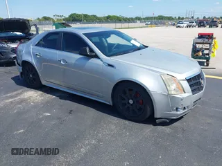 2012 Cadillac CTS Luxury z VIN 1G6DH5E59C0126327, wystawiony jako IAAI lot #42291467 z przebiegiem 209 605 mil mil oraz . Historia ofert i sprzedaży dostępna na DreamBid. Obrazek 1.