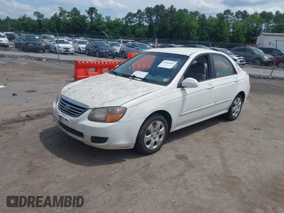 2009 Kia Spectra EX with VIN KNAFE221595606467, listed as a IAAI auction lot 42484042 with 217,439 mi miles and . Bid and sale history available at DreamBid. Image 2.