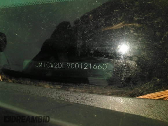 2012 Mazda 5 Grand Touring with VIN JM1CW2DL9C0121660, listed as a IAAI auction lot 38250695 with 119,389 mi miles. Bid and sale history available at carsss.com. Image 9.