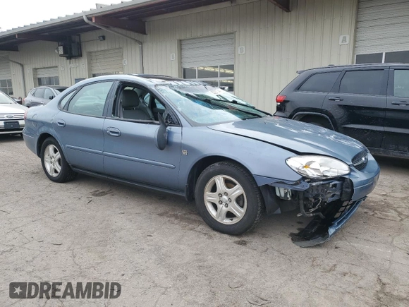 2000 Ford Taurus SEL with VIN 1FAFP56S2YG160062, listed as a Copart auction lot 82297744 with 97,218 mi miles and Salvage title. Bid and sale history available at DreamBid. Image 4.