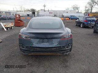 2021 Tesla Model S Long Range with VIN 5YJSA1E51MF440929, listed as a IAAI auction lot 41144902 with Not provided miles and . Bid and sale history available at DreamBid. Image 16.