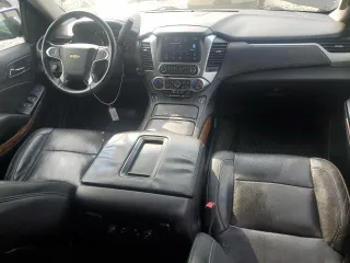 2015 Chevrolet Suburban LTZ with VIN 1GNSKKKC8FR199218, listed as a Copart auction lot 64147184 with 181,676 mi miles and Salvage Title. Bid and sale history available at DreamBid. Image 8.
