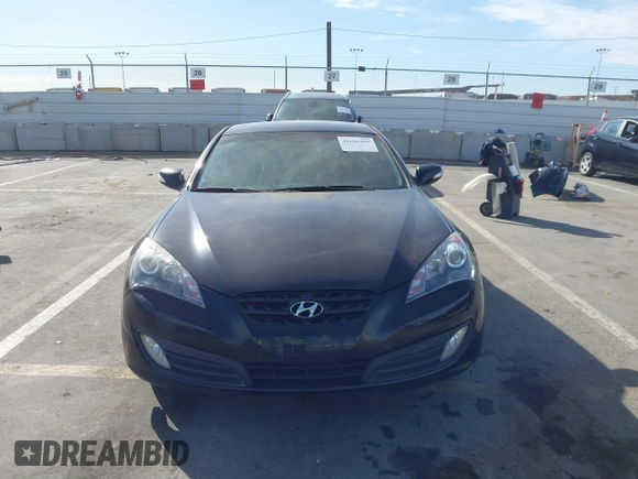 2012 Hyundai Genesis Coupe Grand Touring with VIN KMHHU6KH8CU068486, listed as a IAAI auction lot 41686499 with 104,579 mi miles and . Bid and sale history available at DreamBid. Image 12.
