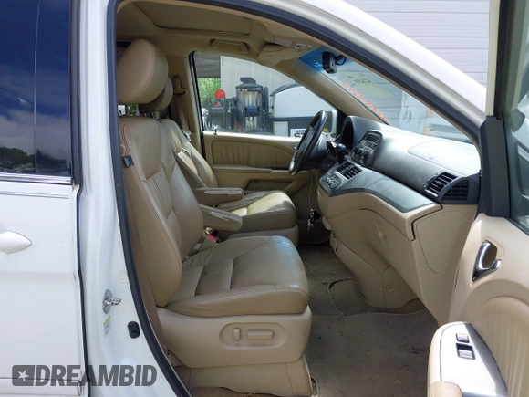 2010 Honda Odyssey EX-L with VIN 5FNRL3H67AB003148, listed as a IAAI auction lot 42244575 with 176,119 mi miles and . Bid and sale history available at DreamBid. Image 5.