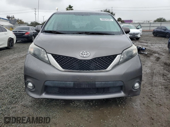2014 Toyota Sienna SE with VIN 5TDXK3DC3ES470042, listed as a Copart auction lot 49254335 with 99,208 mi miles and Salvage Title. Bid and sale history available at DreamBid. Image 5.