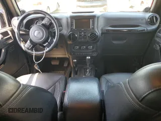 2014 Jeep Wrangler Unlimited Sahara with VIN 1C4HJWEG5EL312006, listed as a Copart auction lot 61821445 with 159,416 mi miles and Salvage title. Bid and sale history available at DreamBid. Image 8.