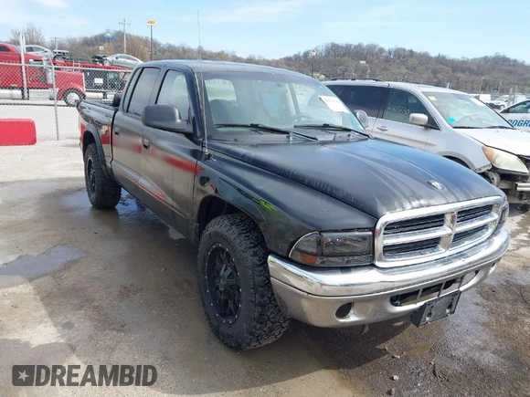 2004 Dodge Dakota SLT with VIN 1D7HL48N04S654059, listed as a IAAI auction lot 41811540 with 165,615 mi miles. Bid and sale history available at carsss.com. Image 1.