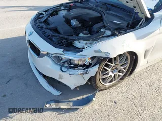 2015 BMW 4 Series 428i xDrive with VIN WBA3T1C51FP821140, listed as a IAAI auction lot 41802697 with 95,232 mi miles and . Bid and sale history available at carsss.com. Image 6.