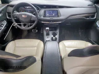 2019 Cadillac XT4 AWD Sport z VIN 1GYFZFR45KF175735, wystawiony jako Copart lot #57607195 z przebiegiem 145 877 mil mil oraz Tytuł czysty. Historia ofert i sprzedaży dostępna na DreamBid. Obrazek 8.