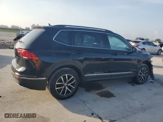 2021 Volkswagen Tiguan SE with VIN 3VV3B7AXXMM085722, listed as a Copart auction lot 54438285 with 76,746 mi miles and Clean Title. Bid and sale history available at carsss.com. Image 3.