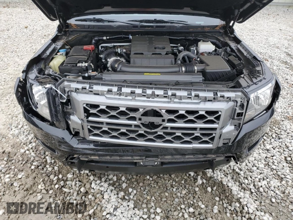 2024 Nissan Frontier SV z VIN 1N6ED1EJ6RN610001, wystawiony jako Copart lot #86741134 z przebiegiem 4 560 mil mil oraz Szkoda całkowita • Salvage title. Historia ofert i sprzedaży dostępna na DreamBid. Obrazek 11.