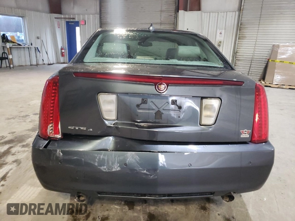 2010 Cadillac STS AWD z VIN 1G6DU6EV5A0113671, wystawiony jako Copart lot #47447395 z przebiegiem 77 062 mil mil oraz Tytuł czysty. Historia ofert i sprzedaży dostępna na DreamBid. Obrazek 6.