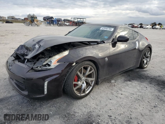 2014 Nissan 370Z Nismo with VIN JN1AZ4EH3EM633305, listed as a Copart auction lot 42846795 with 45,430 mi miles and Salvage Title. Bid and sale history available at DreamBid. Image 1.