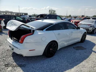 2015 Jaguar XJ with VIN SAJWA1CZ8F8V81637, listed as a Copart auction lot 55619555 with 88,328 mi miles and Salvage Title. Bid and sale history available at DreamBid. Image 3.