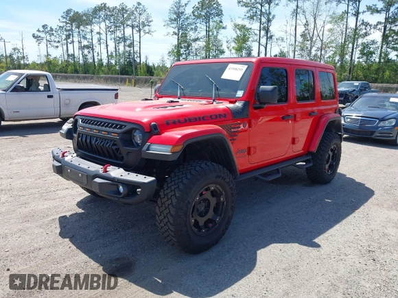 2020 Jeep Wrangler Unlimited Rubicon with VIN 1C4HJXFG9LW106607, listed as a IAAI auction lot 41908295 with 71,083 mi miles and . Bid and sale history available at DreamBid. Image 17.