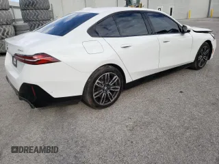 2024 BMW 5 Series 530i with VIN WBA43FJ02RCR63663, listed as a Copart auction lot 86215024 with 3,328 mi miles and Salvage Title. Bid and sale history available at carsss.com. Image 3.