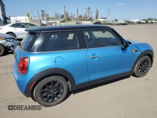 2017 MINI Hardtop Cooper with VIN WMWXP5C33H2G60921, listed as a Copart auction lot 58139295 with 94,599 mi miles and Salvage title. Bid and sale history available at DreamBid. Image 3.