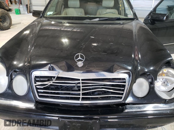1998 Mercedes-Benz E-Class with VIN WDBJF65FXWA648112, listed as a Copart auction lot 47074665 with 0 mi miles and Salvage Title. Bid and sale history available at carsss.com. Image 11.