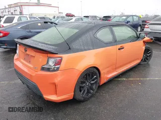 2015 Scion tC with VIN JTKJF5C79FJ007842, listed as a IAAI auction lot 41560881 with 155,436 mi miles. Bid and sale history available at carsss.com. Image 4.