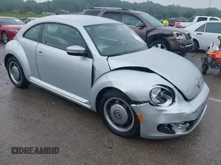 2012 Volkswagen Beetle 2.5L PZEV with VIN 3VWJP7AT7CM601230, listed as a IAAI auction lot 42423176 with 78,779 mi miles and . Bid and sale history available at DreamBid. Image 1.