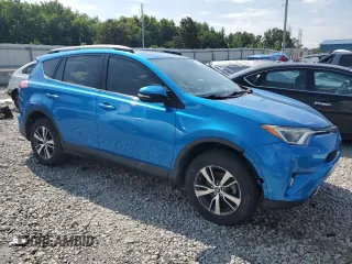 2017 Toyota RAV4 XLE with VIN JTMWFREV6HJ714920, listed as a Copart auction lot 63988704 with 61,221 mi miles and Salvage Title. Bid and sale history available at DreamBid. Image 4.