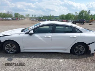 2023 Kia K5 LXS z VIN 5XXG14J25PG189448, wystawiony jako IAAI lot #42258739 z przebiegiem 29 188 mil mil oraz . Historia ofert i sprzedaży dostępna na DreamBid. Obrazek 15.