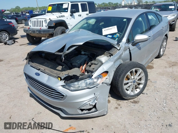 2019 Ford Fusion SE with VIN 3FA6P0LU1KR222141, listed as a IAAI auction lot 42000677 with 122,898 mi miles and . Bid and sale history available at carsss.com. Image 6.