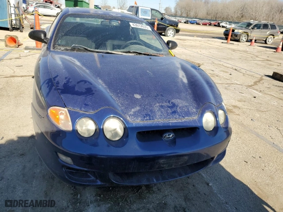 2001 Hyundai Tiburon with VIN KMHJG25F11U261457, listed as a Copart auction lot 43012635 with 165,625 mi miles and Salvage Title. Bid and sale history available at carsss.com. Image 5.